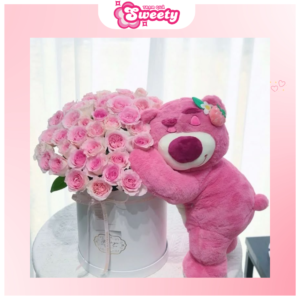 Gấu Teddy ôm hoa